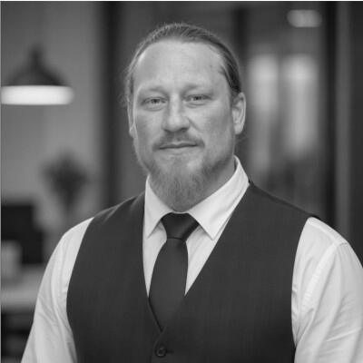 Portrait of a Ctrl-Alt-Swede co-founder in a waistcoat and tie